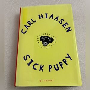 SIGNED Carl Hiaasen "Sick Puppy" First edition hardcover with dust jacket humor
